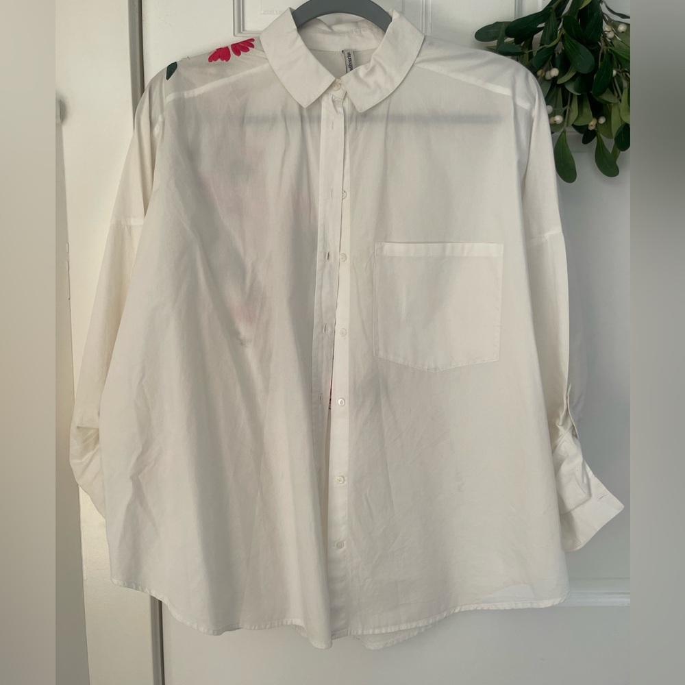 Woman embroidered cotton button down shirt.